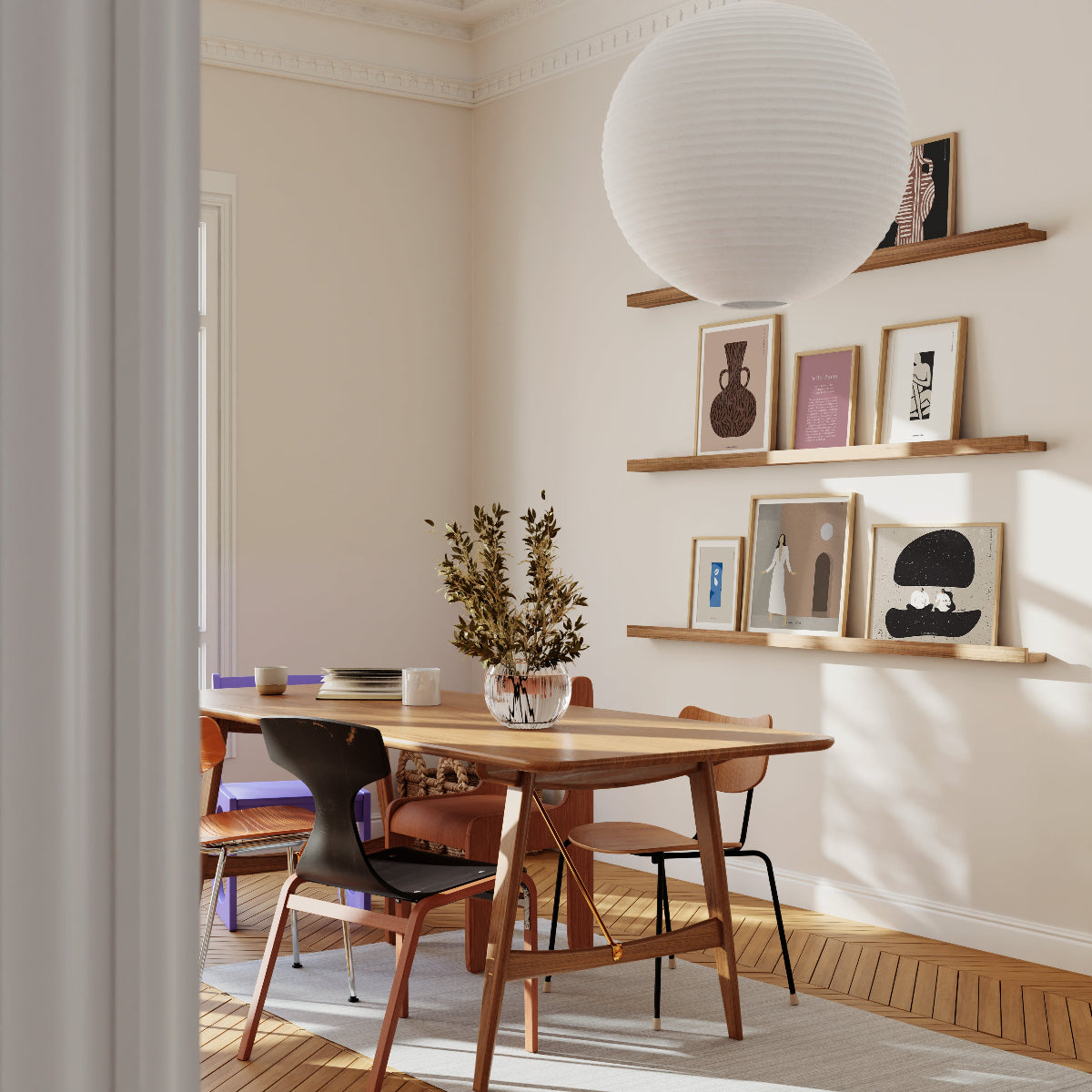 Dining room with wooden table and chairs, shelves with decor, and large spherical light fixture.