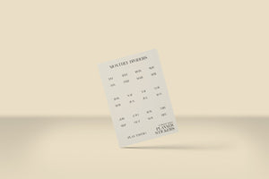Sheet of paper with monthly divisions on a beige background