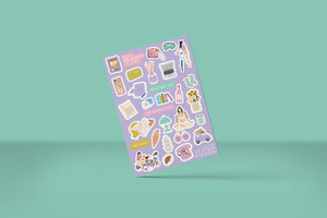 Sheet of planner stickers with various designs on a purple background 