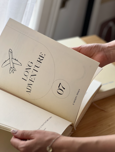 Close-up of Travel Book pages filled with handwritten reflections and travel notes